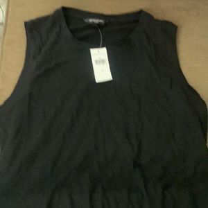 Linen sleeveless blouse with tie knot at the bottom